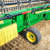 Шарнирная ленточная жатка John Deere HD35X